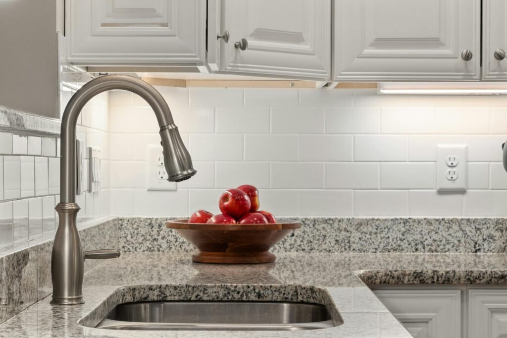 A bright kitchen with clear counters and minimal styling.
